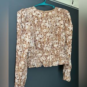 Express metallic floral top.